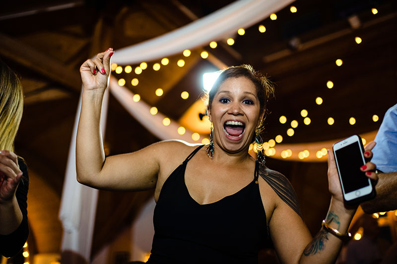 Smiling Guest as she dances on the dance floor to the Boston Premier band