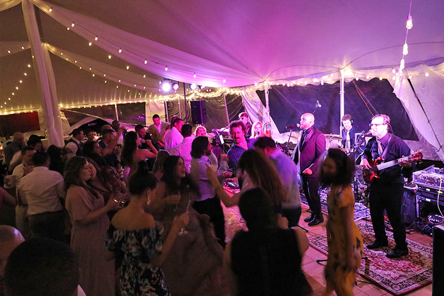 Wedding guests danced the night away as Boston Premier performed on stage at the wedding.