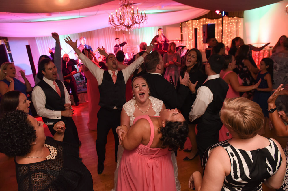 Wedding guests dancing to The Boston Premier band.
