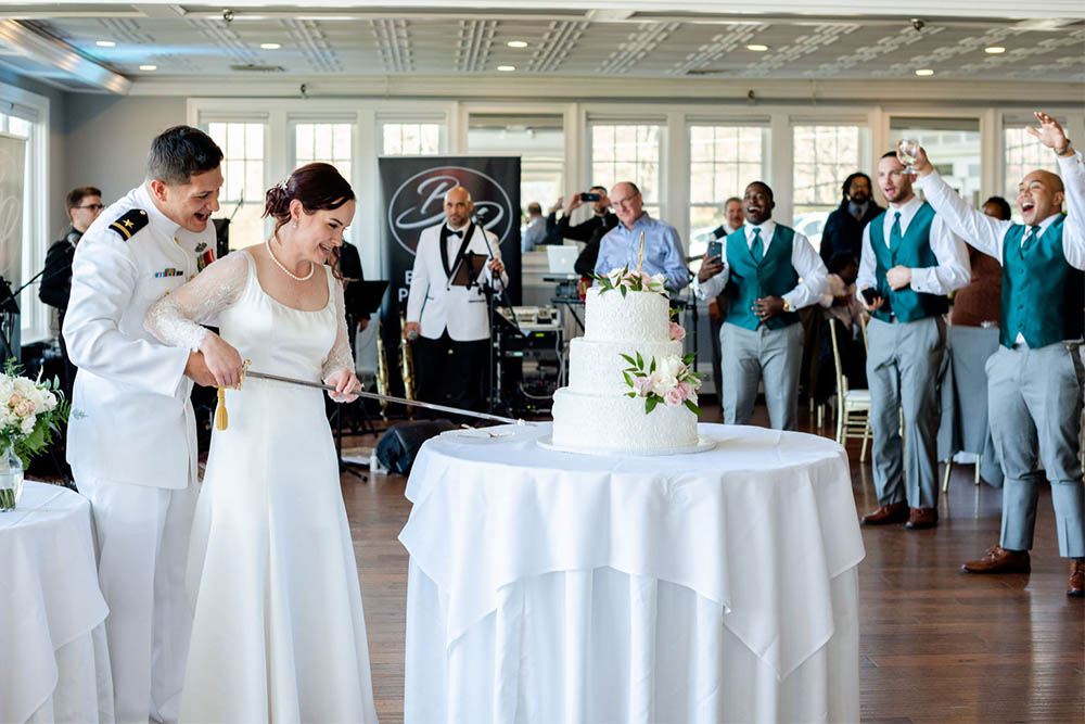 The Bride and groom cut their cake at their wedding reception.