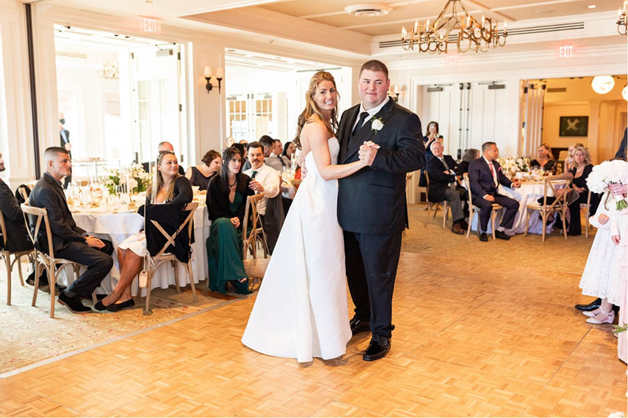 Jennifer and Dominic share their first dance together on the dancefloor