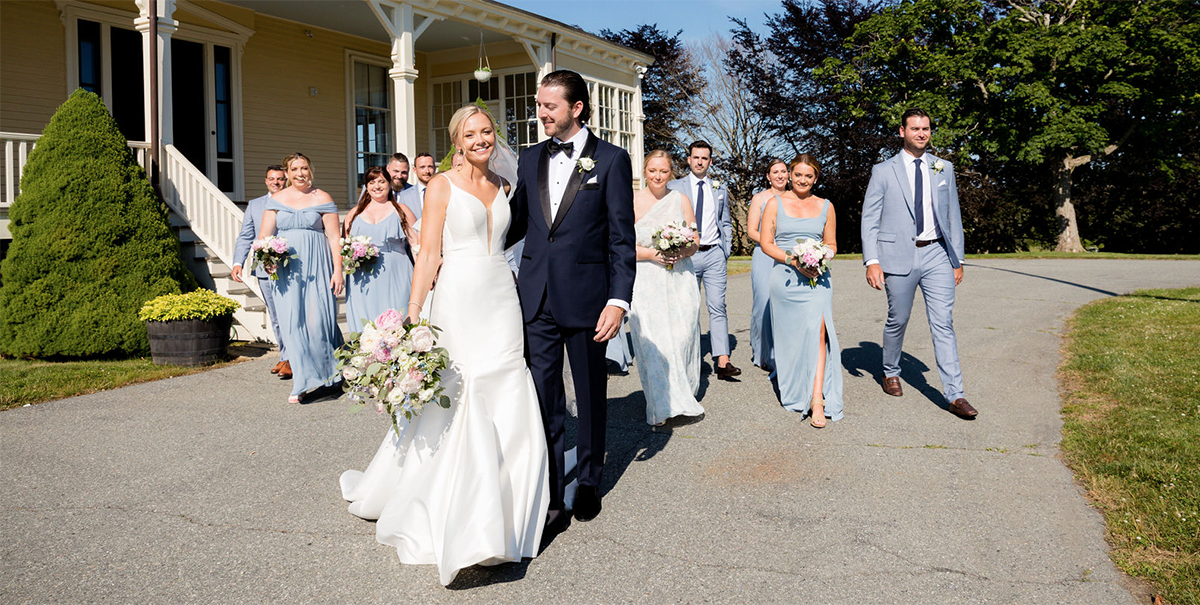 The bride and groom arrive with their bridal party at The Eisenhower House in Newport