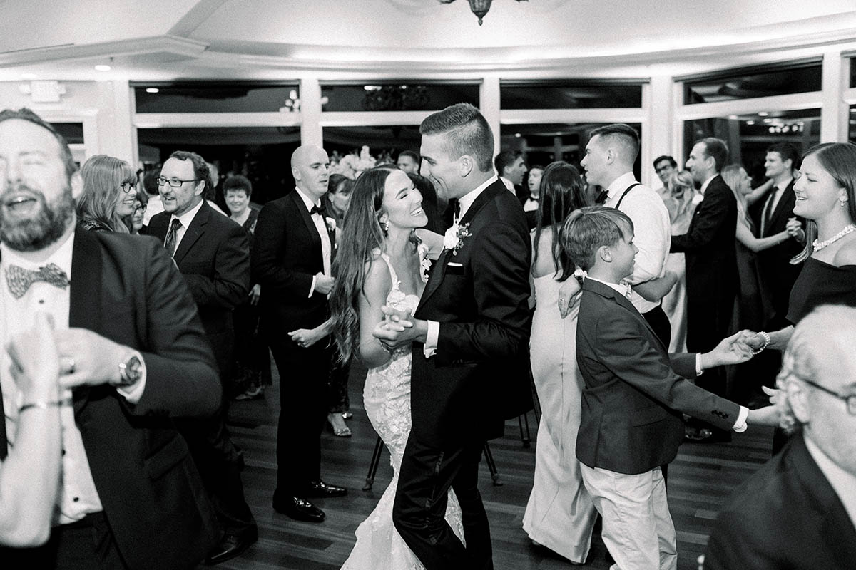 The Bride and groom dancing with family and friends as Boston Premier performs at their Newport Wedding.