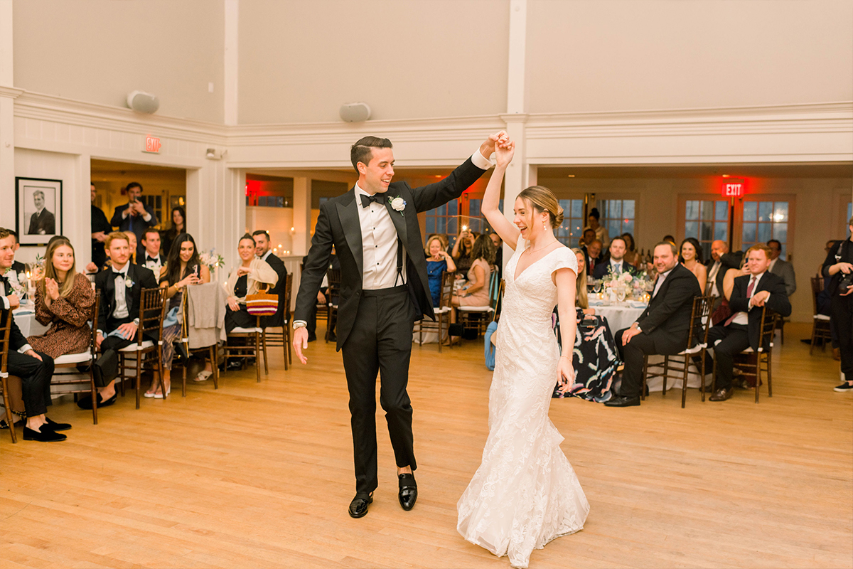 The bride and groom dancing to their first dance being played by The Boston Premier Band