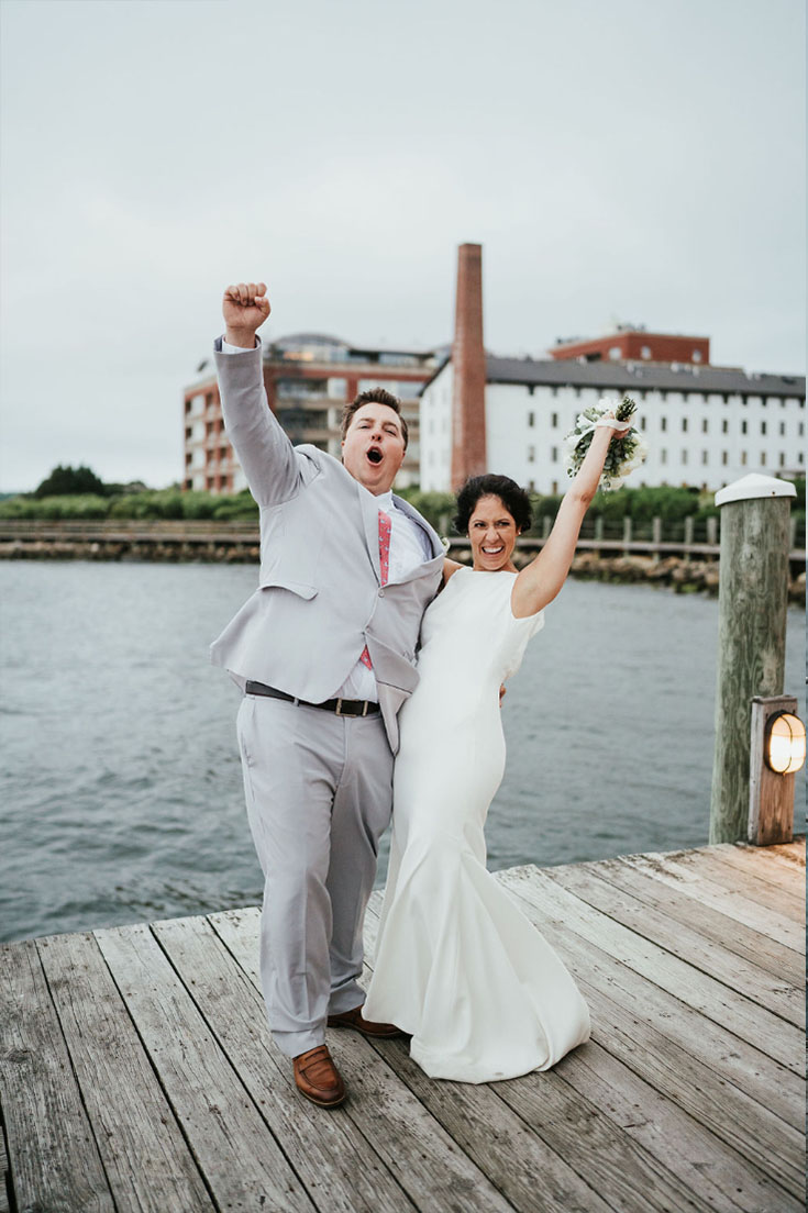 The bride and groom cheering