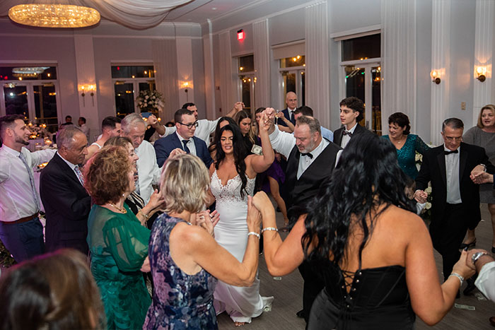 Guests dance to their favorite song being played by a Boston Wedding band