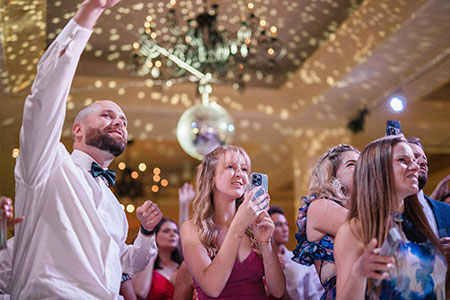 Wedding guests dancing to the music of Boston Premier at the Boston Long Wharf Hotel