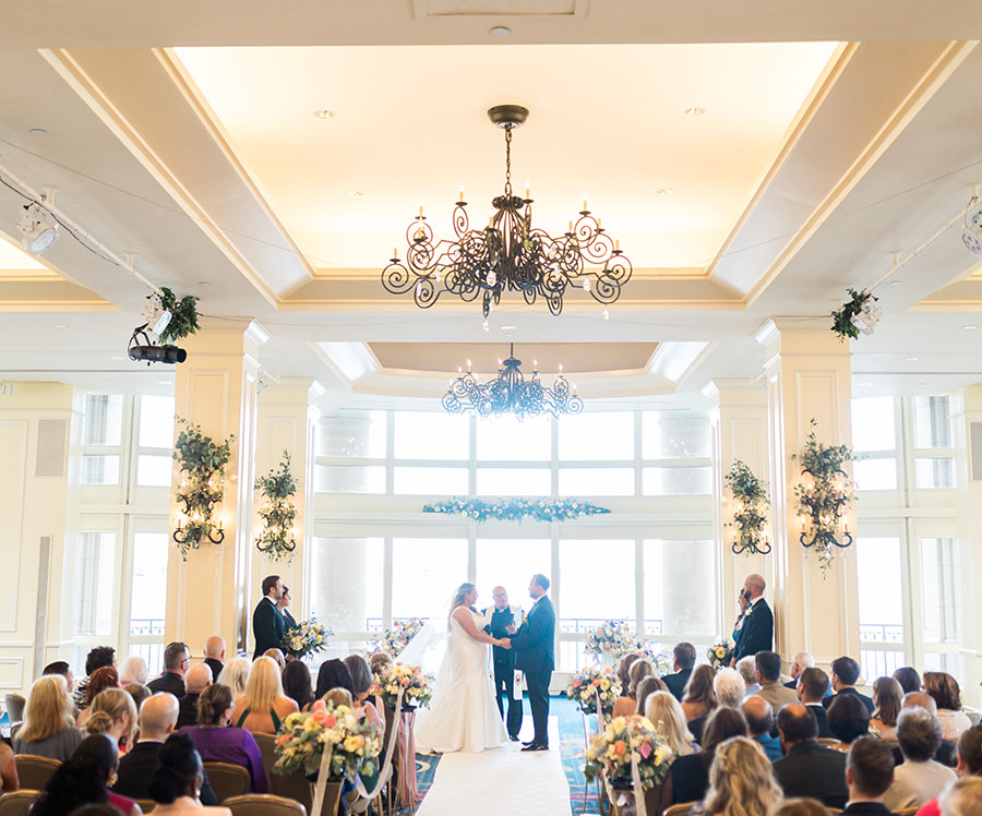 Jennifer and Don exchanging vows in the Wharf Ballroom at the Boston Harbor Hotel.