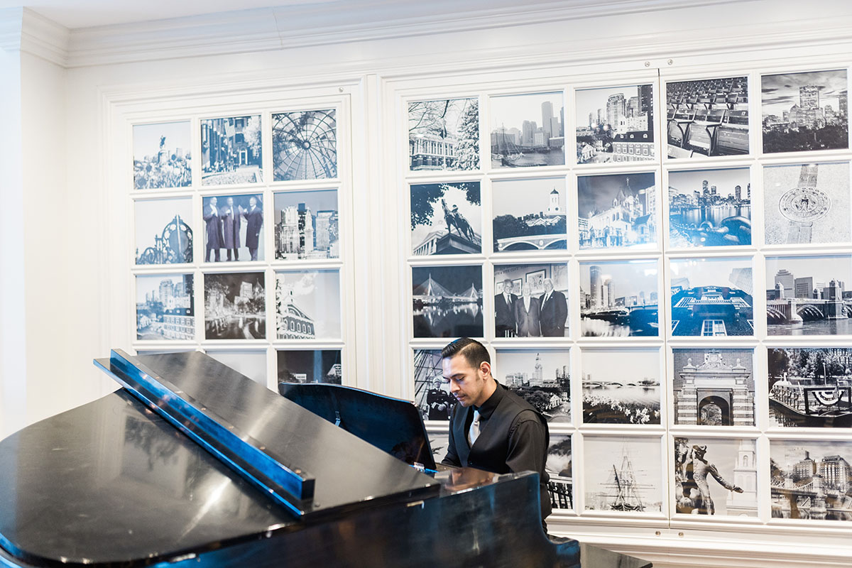 Our Pianist plays the grand piano for guests in the Boston Harbor Hotel Lobby.