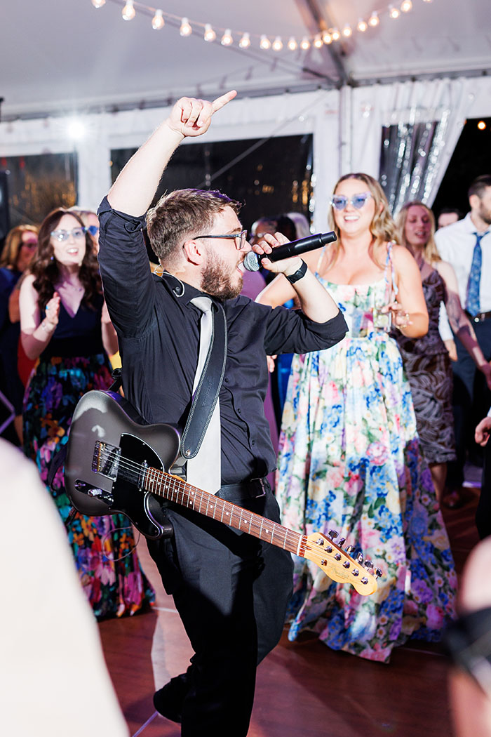 Boston Premier guitarist firing up the crowd at the wedding held at the garden at elms.