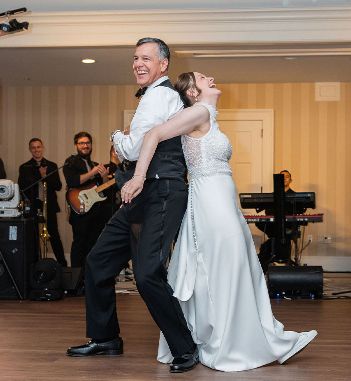 Nicole and her father dancing to their special song of the night.