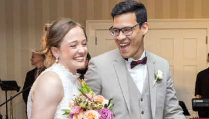 A COUPLE BEING INTRODUCED INTO THE BALLROOM AT WELLESLEY CC.